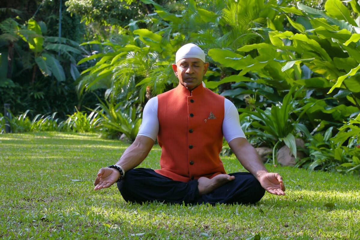 A serene meditation setting illustrating the journey of Kundalini Awakening.